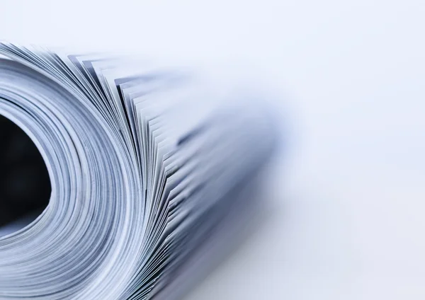 Rolled up magazine — Stock Photo, Image