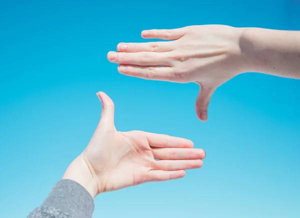 Mani che fanno una cornice — Foto Stock