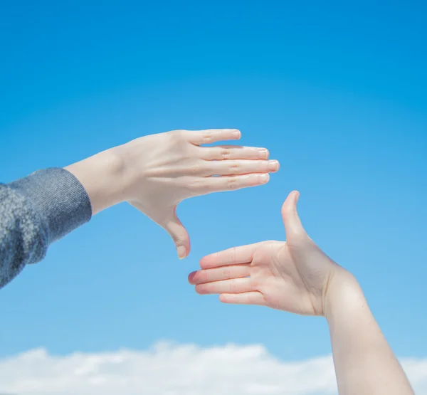 Handen maken een frame — Stockfoto