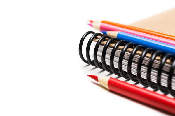 Notebook and color pencils — Stock Photo, Image