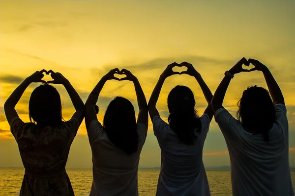 Silhouette hand in heart shape — Stock Photo, Image