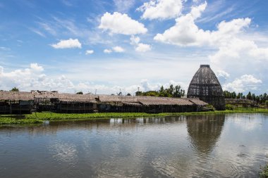The biggest coop made from the bamboo structure is a trap for catching fish at Saphanburi Arch bridge local Market, Thailand.
