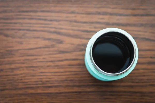 Black Coffee Blue Cup Wooden Table — Stock Photo, Image