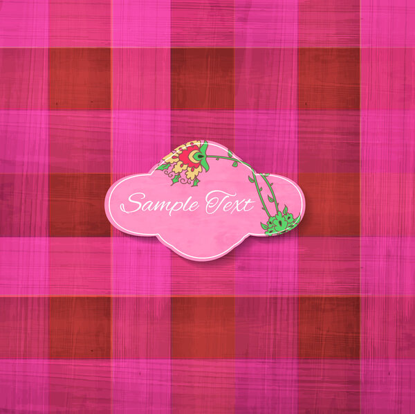 Цветные квадратные текстуры ткани фон с бумажной цветочной этикеткой
