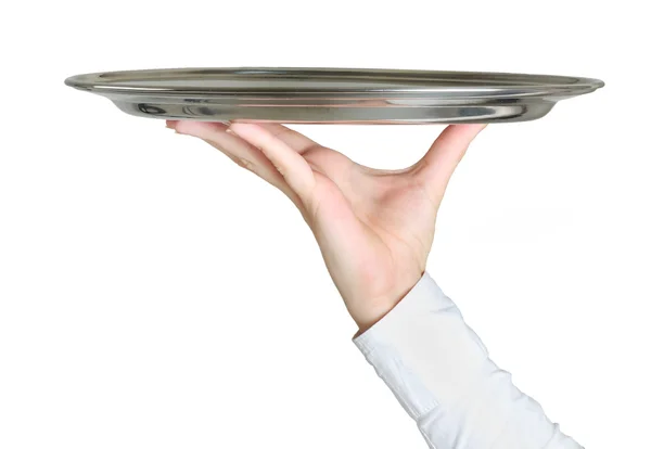 Hand holding empty dish — Stock Photo, Image