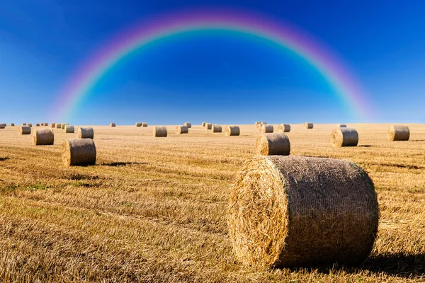 Straw bales and rainbow — Stock Photo, Image