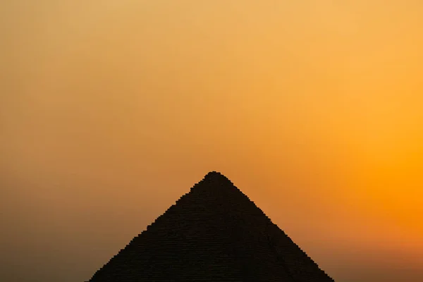 The perfect silhouette of the Giza pyramid in Egypt at sunset