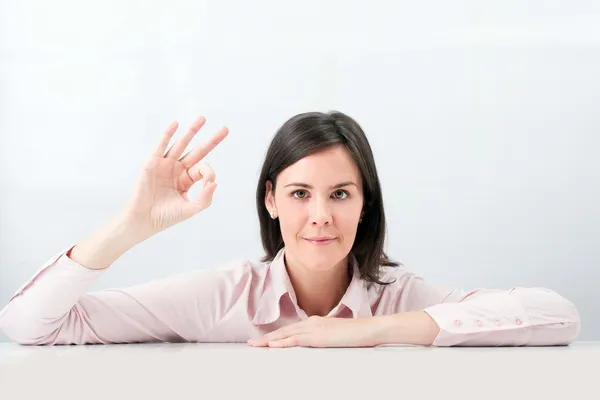 Happy smiling beautiful young woman show OK gesture. — Stock Photo, Image