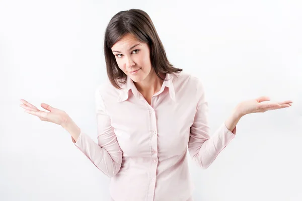 Mulher de negócios bonita gesticulando com incerteza . — Fotografia de Stock