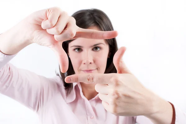 Zakenvrouw een hand-frame maken. — Stockfoto