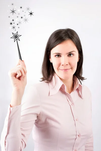 Donna d'affari avendo una buona idea con bacchetta magica . — Foto Stock