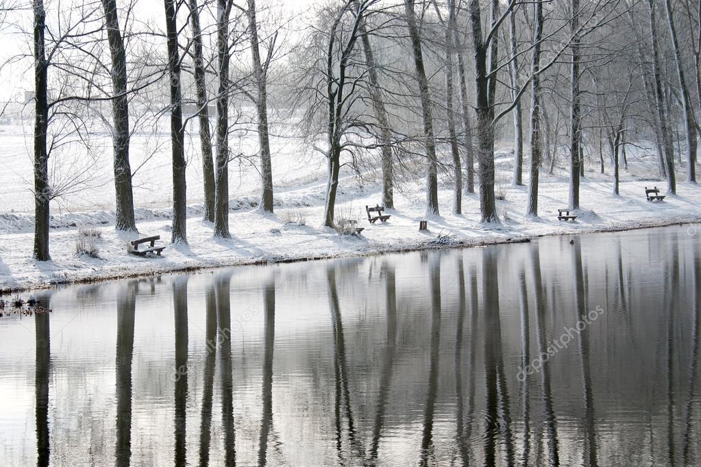 Winter landscape with reflection - stock photo.