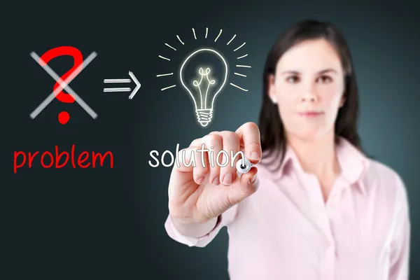 Young business woman eliminate problem and find solution. — Stock Photo, Image