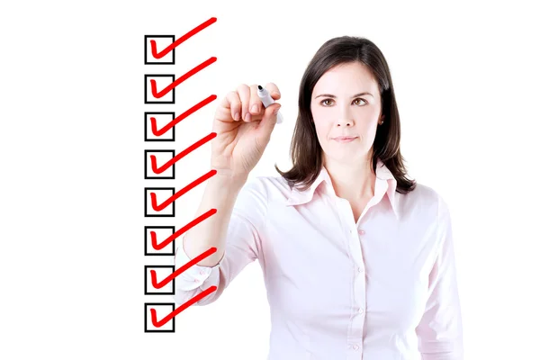 Young business woman checking on checklist boxes. Isolated on white. — Stock Photo, Image