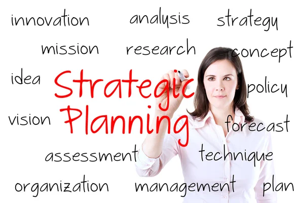 Ung affärskvinna skriva strategiska planering koncept. isolerad på vit. — Stockfoto