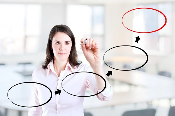 Young business woman drawing flowchart diagram. Office background. — Stock Photo, Image