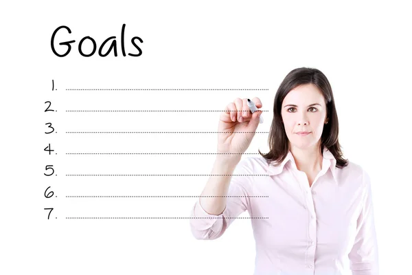 Mujer de negocios escribiendo una lista de objetivos en blanco. Aislado sobre blanco . —  Fotos de Stock