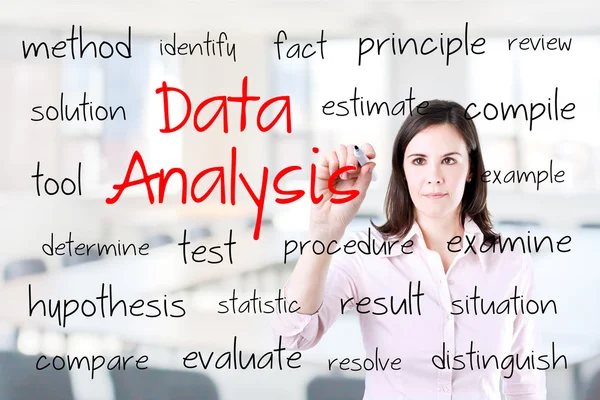 Young business woman writing data analysis concept. Office background. — Stock Photo, Image