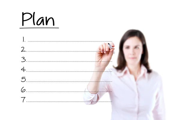 Business woman writing blank plan list. Isolated on white. — Stock Photo, Image