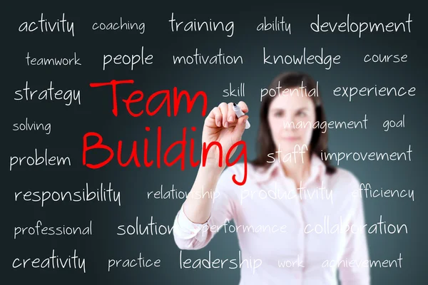 Business hand writing team building concept — Stock Photo, Image