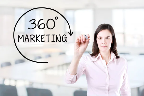 Businesswoman drawing a 360 degrees Marketing concept on the virtual screen. Office background. — Stock Photo, Image