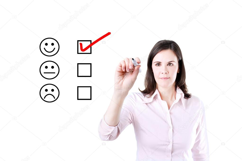 Hand putting check mark with red marker on customer service evaluation form.