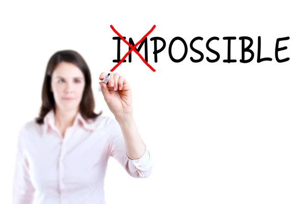 Businesswoman choosing Possible instead of Impossible. Isolated on white. — Stock Photo, Image