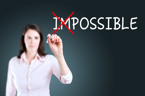 Businesswoman choosing Possible instead of Impossible. Blue background.