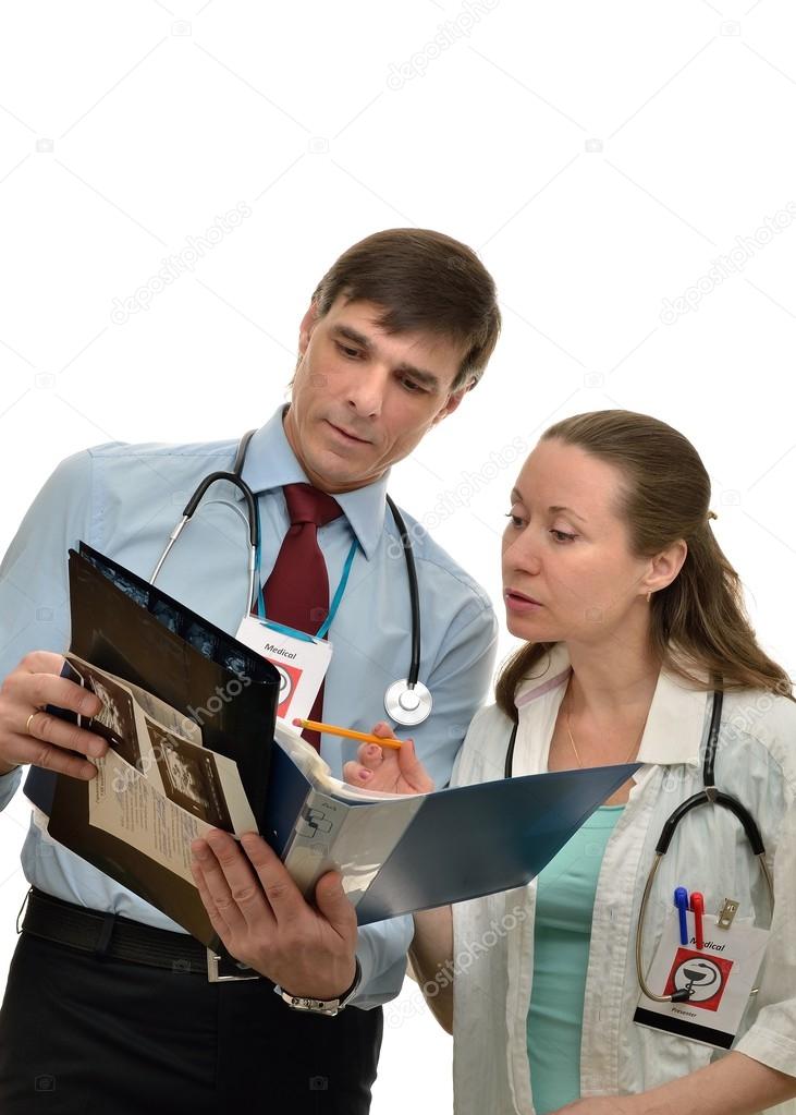 Doctors woman and man working together