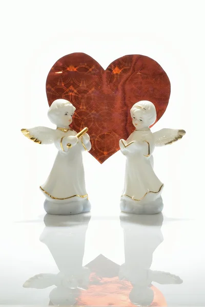 Anjos e coração vermelho — Fotografia de Stock