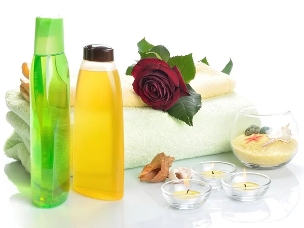 Produits pour soins du corps, spa, sauna et une fleur — Photo