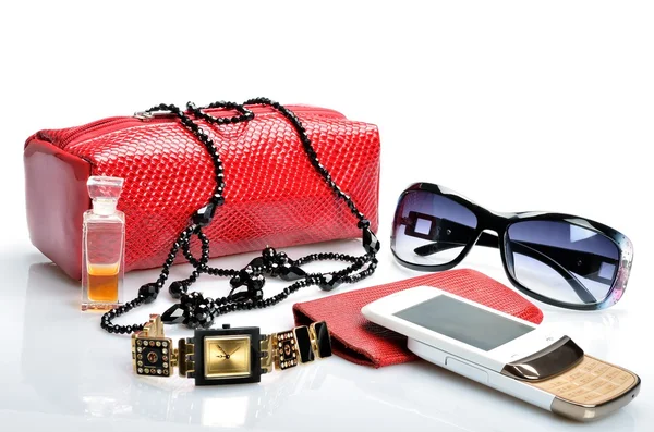 Dámské kabelky pro kosmetiku, doplňky, sluneční brýle, mobil, hodinky Royalty Free Stock Obrázky