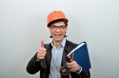 Chief of Construction of a build a house graduated and rejoices clipart
