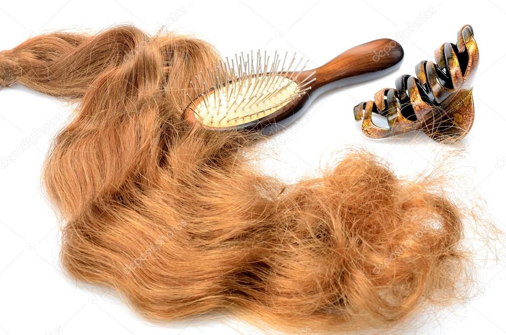 Artificial hair and accessories: comb, barrette for women hairstyles in still life