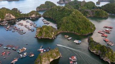 Floating fishing village and rock island in 