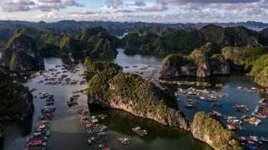 Floating fishing village and rock island in 