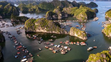 Floating fishing village and rock island in 