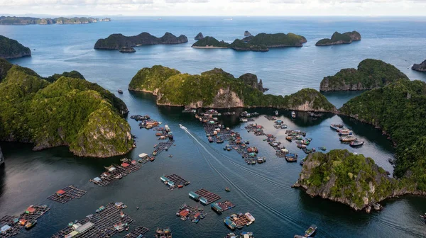 Floating fishing village and rock island in 