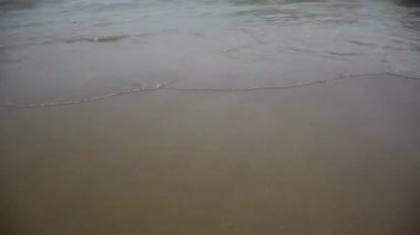 Sea waves water breaking on the beach of Puri beach in the bay of Bengal, Odisha, India. February 2020.