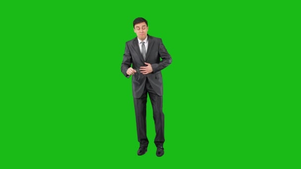 Unhealthy businessman coughing in chroma key studio — Stockvideo