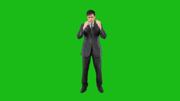 Businessman showing money gesture in studio. Chroma key — Stock videók