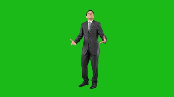 Aggressive man in formal suit. Chroma key — Stockvideo