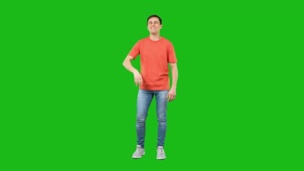 Confident young man gesturing thumb up and smiling at camera — Stock Video