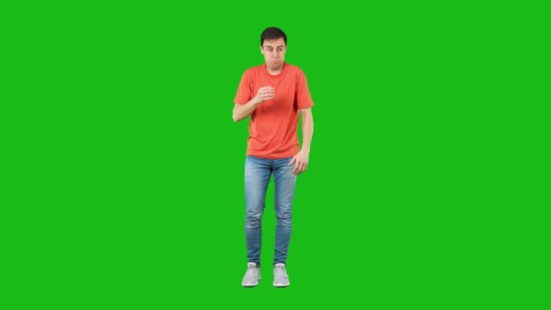 Man plugging nose from bad smell. Green background — Αρχείο Βίντεο