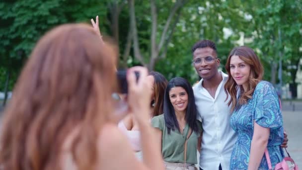 Woman Taking Photo Her Multicultural Group Friends Park — Stock Video