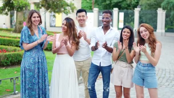 Group Multiethnic Friends Applauding While Looking Camera Outdoors — Video