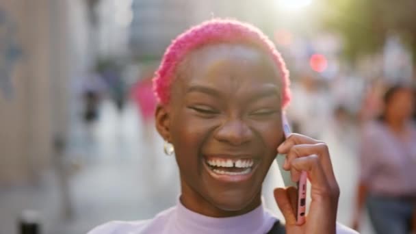 Stylish Afro Woman Laughing While Talking Mobile City Street — Stockvideo