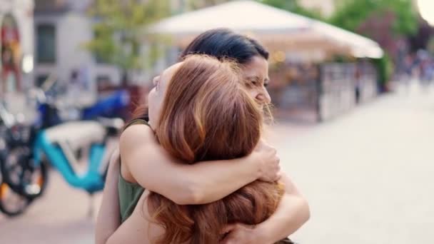 Two Caucasian Friends Embrace Effusively Meeting — Stock video