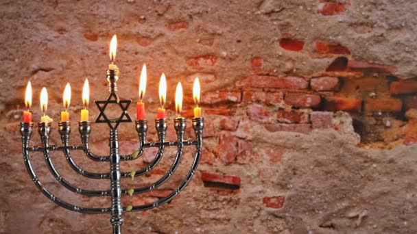 Jewish lights holiday of Hanukkah a burning menorah symbol of Judaism traditional holiday — Stock Video