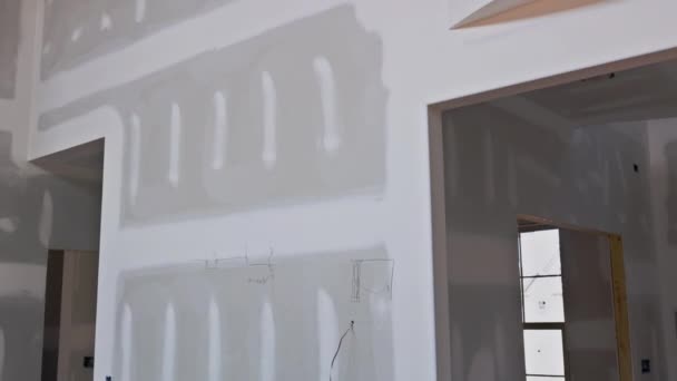 New house under construction with finishing plastering drywall — Stock Video